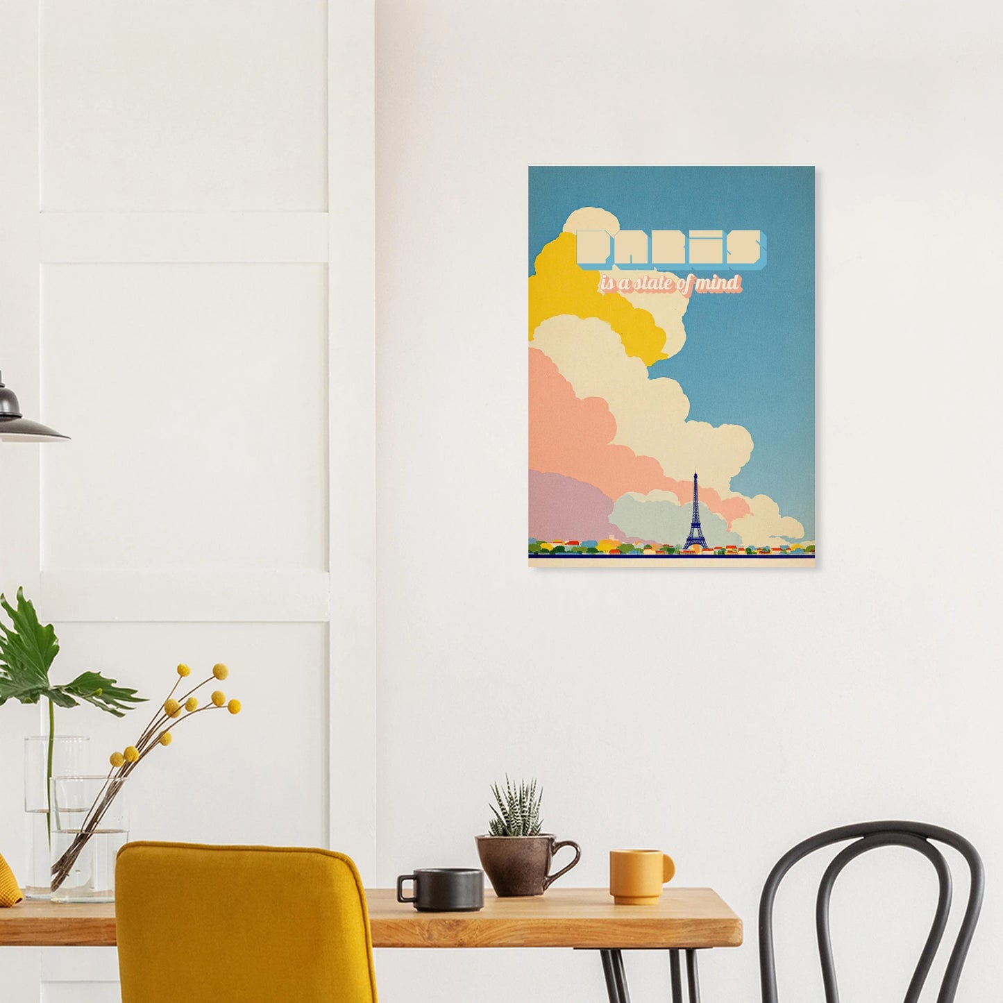 Modern dining area with a Paris wall art print, colorful clouds, Eiffel Tower, and clean decor.