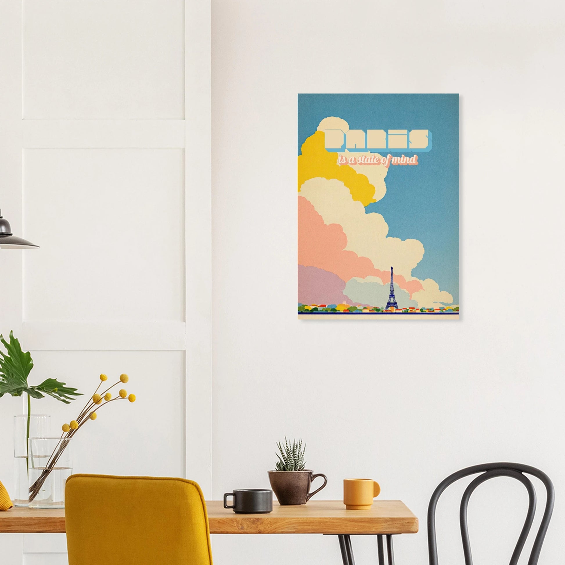 Modern dining area with a Paris wall art print, colorful clouds, Eiffel Tower, and clean decor.