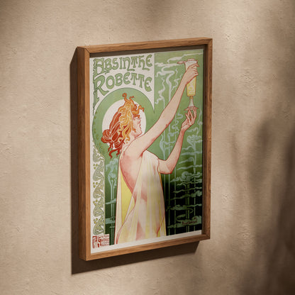 Absinthe Robette - Privat-Livemont, affiche dans un cadre en chêne posé de biais sur un mur texturé