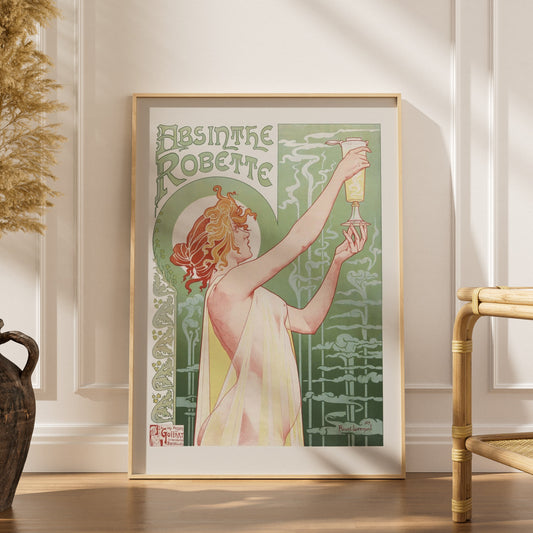 Absinthe Robette - Privat-Livemont, affiche encadrée dans un intérieur élégant, herbes séchées et chaise en rotin