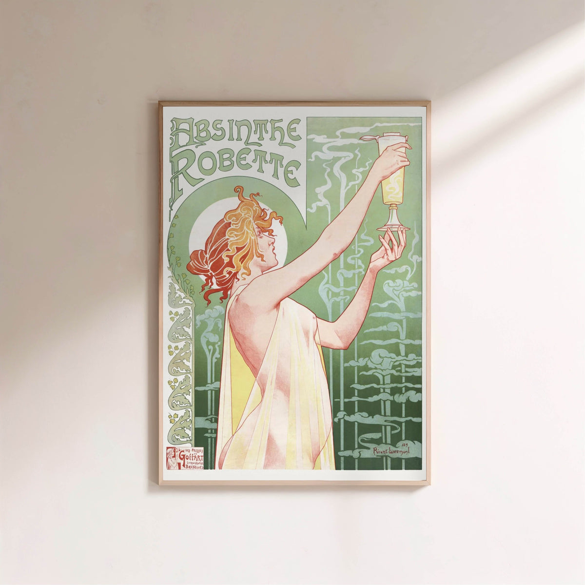 Absinthe Robette - Privat-Livemont, affiche encadrée sur un mur clair