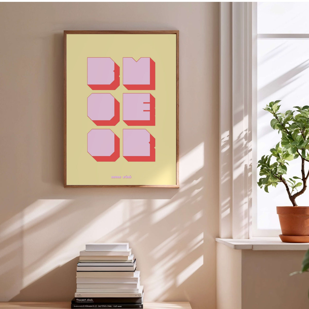 Affiche graphique Boomer, affiche encadrée au-dessus d'une pile de livres