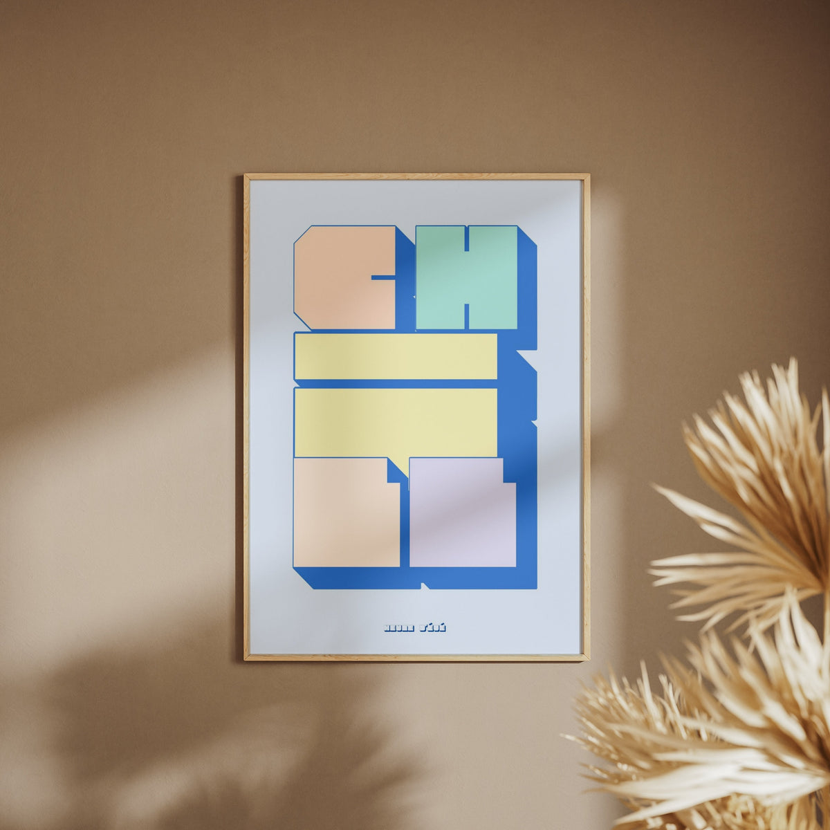 Chill Poster, framed poster on a beige wall, pampas grass in the foreground