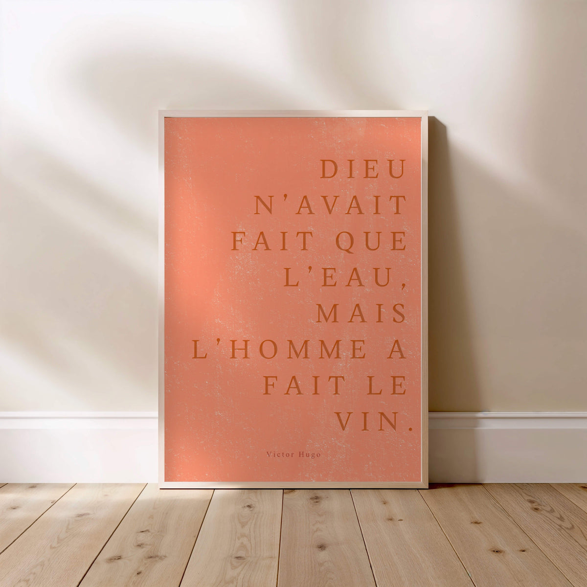 ...Mais l’homme a fait le vin. | Poster Citation, affiche encadrée posée au sol, cadre bois clair