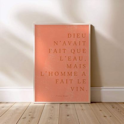 ...Mais l’homme a fait le vin. | Poster Citation, affiche encadrée posée au sol, cadre bois clair