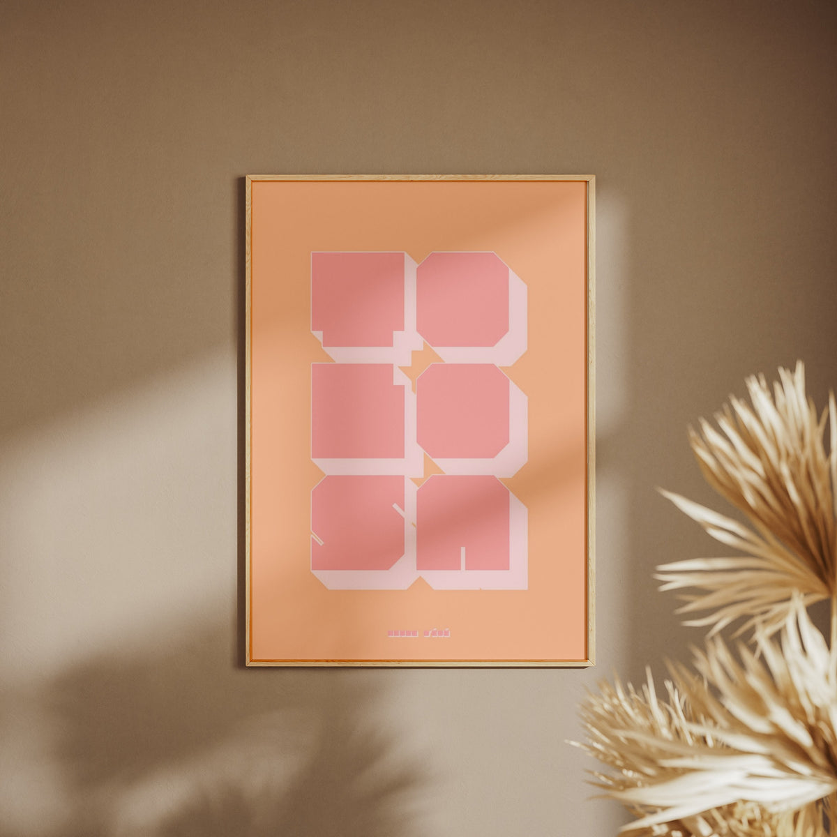 Graphic poster Toulouse - Tolosa, framed poster on a beige wall, pampas grass in the foreground