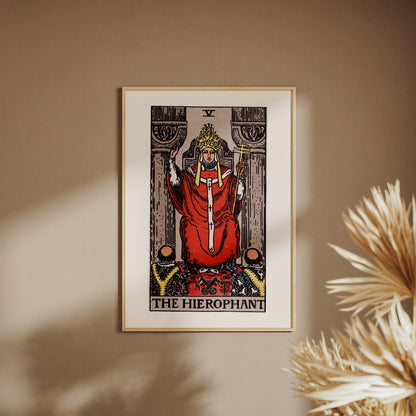 Arcanum V - The Hierophant - Rider-Waite-Smith Tarot Poster, framed poster on a beige wall, pampas grass in the foreground