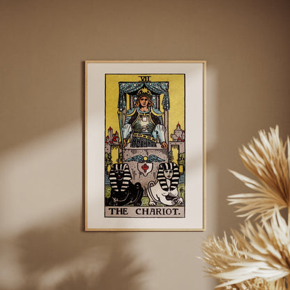 Arcanum VII - The Chariot - Rider-Waite-Smith Tarot Poster, framed poster on a beige wall, pampas grass in the foreground