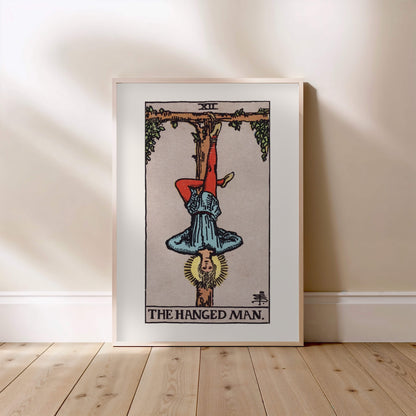 Arcana XII - The Hanged Man - Rider-Waite-Smith Tarot Poster, framed poster standing on the floor, light wood frame