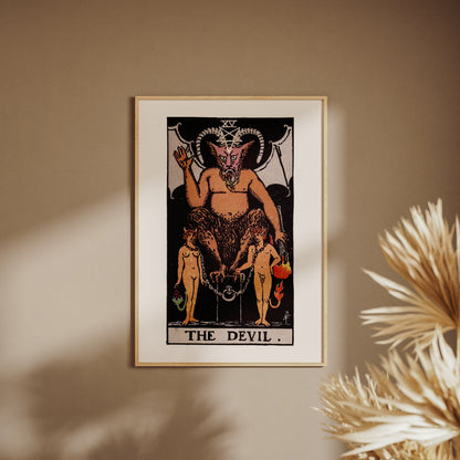 Arcana XV - The Devil - Rider-Waite-Smith Tarot Poster, framed poster on a beige wall, pampas grass in the foreground