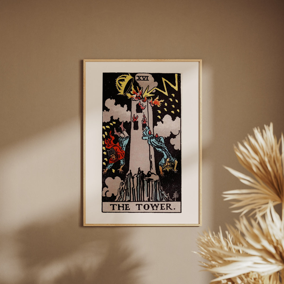 Arcanum XVI - The Tower - Rider-Waite-Smith Tarot Poster, framed poster on a beige wall, pampas grass in the foreground