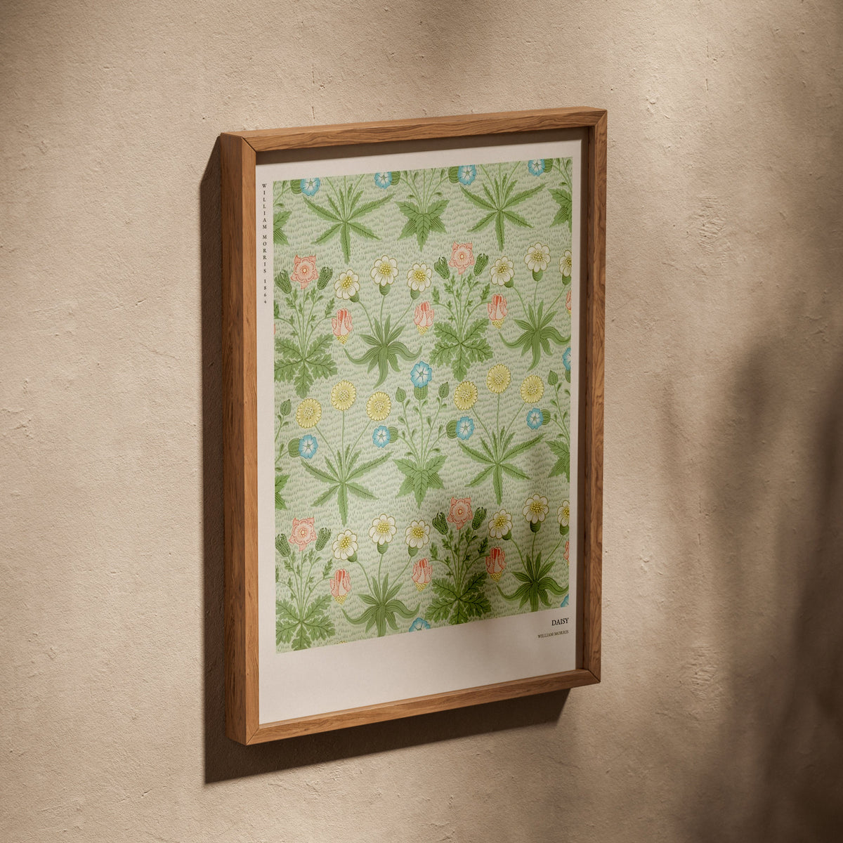 Daisy - William Morris - Arts & Crafts Poster, poster in an oak frame leaning on a textured wall