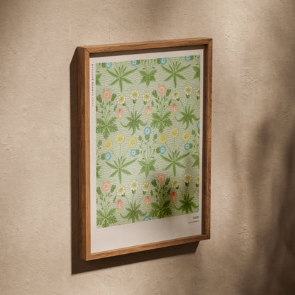 Daisy - William Morris - Arts & Crafts Poster, poster in an oak frame leaning on a textured wall