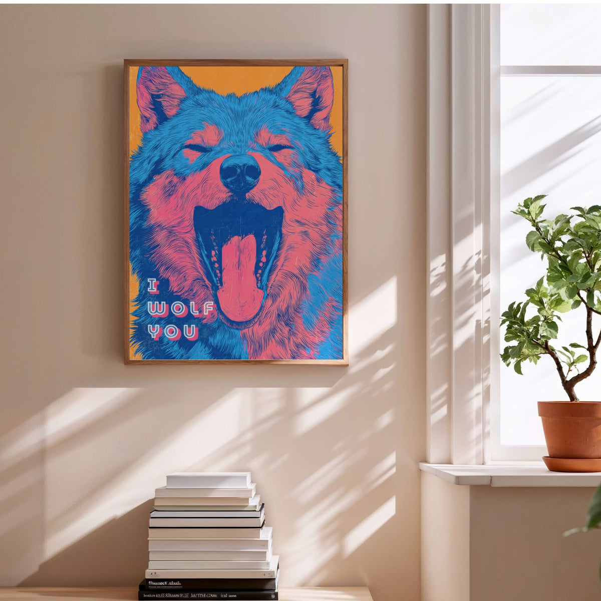 I Wolf You | Poster Dopamine Decor, affiche encadrée au-dessus d'une pile de livres