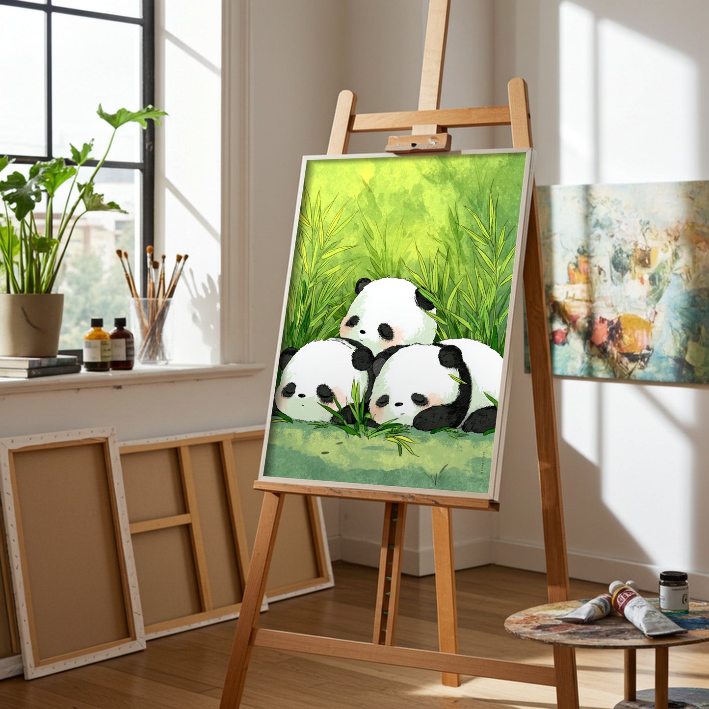 Affiche murale - Trois petits pandas - vue chevalet
