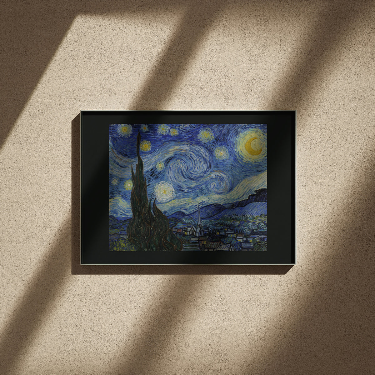 Van Gogh Starry Night print, 24x16 in fine art, framed on a textured wall in raking light