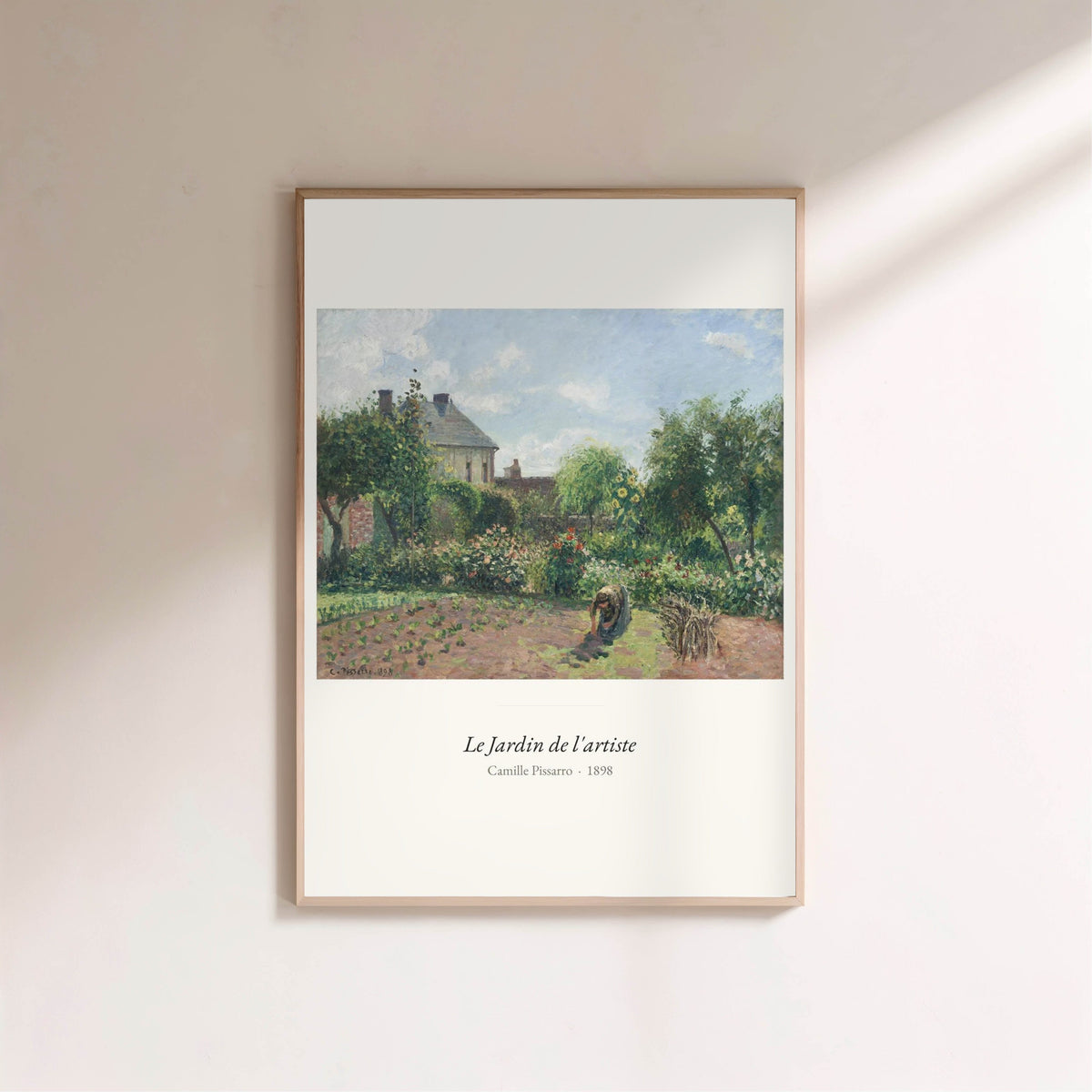 Le Jardin de l'artiste, Camille Pissarro, affiche encadrée sur un mur clair