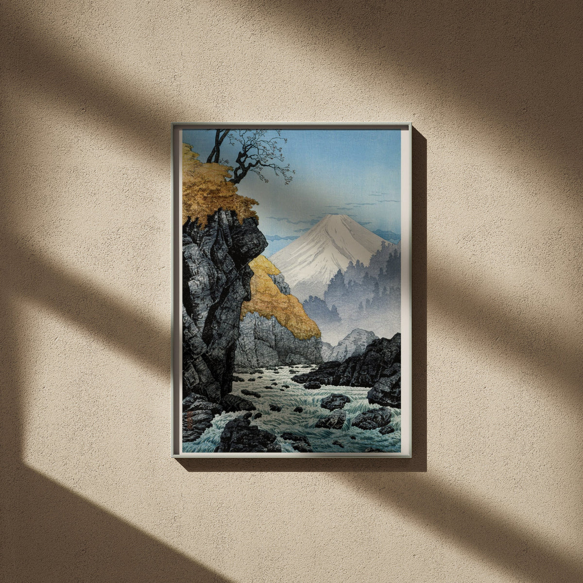 Mount Ashitaka - Hiroaki Takahashi Woodblock Print, framed poster on a beige wall, window shadows
