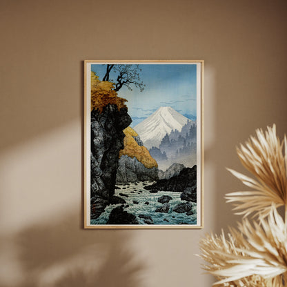 Mount Ashitaka - Hiroaki Takahashi Woodblock Print, framed poster on a beige wall, pampas grass in the foreground