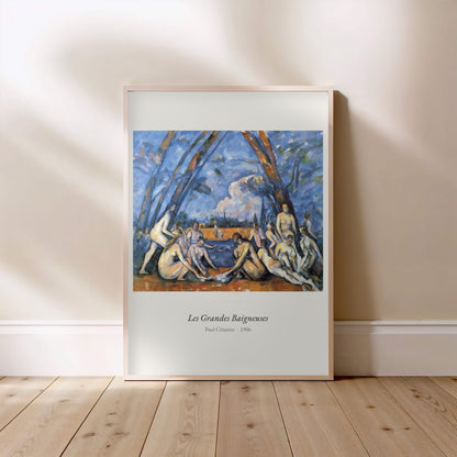 Les Grandes Baigneuses, Paul Cézanne, affiche encadrée posée au sol, cadre bois clair