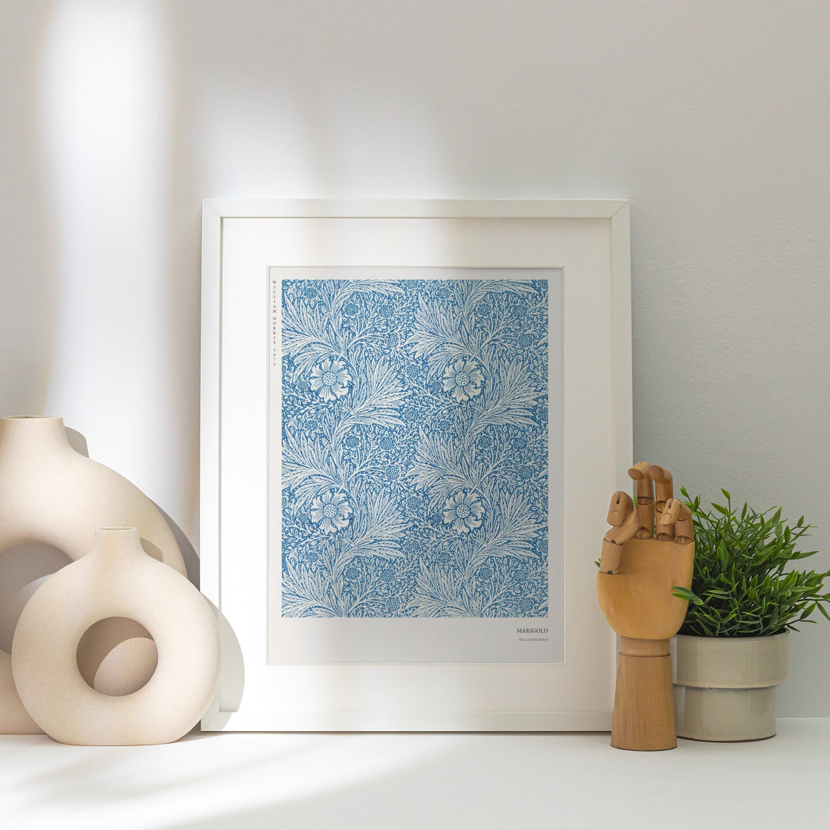 Marigold - William Morris - Arts & Crafts Poster, framed poster next to a white vase, raking light