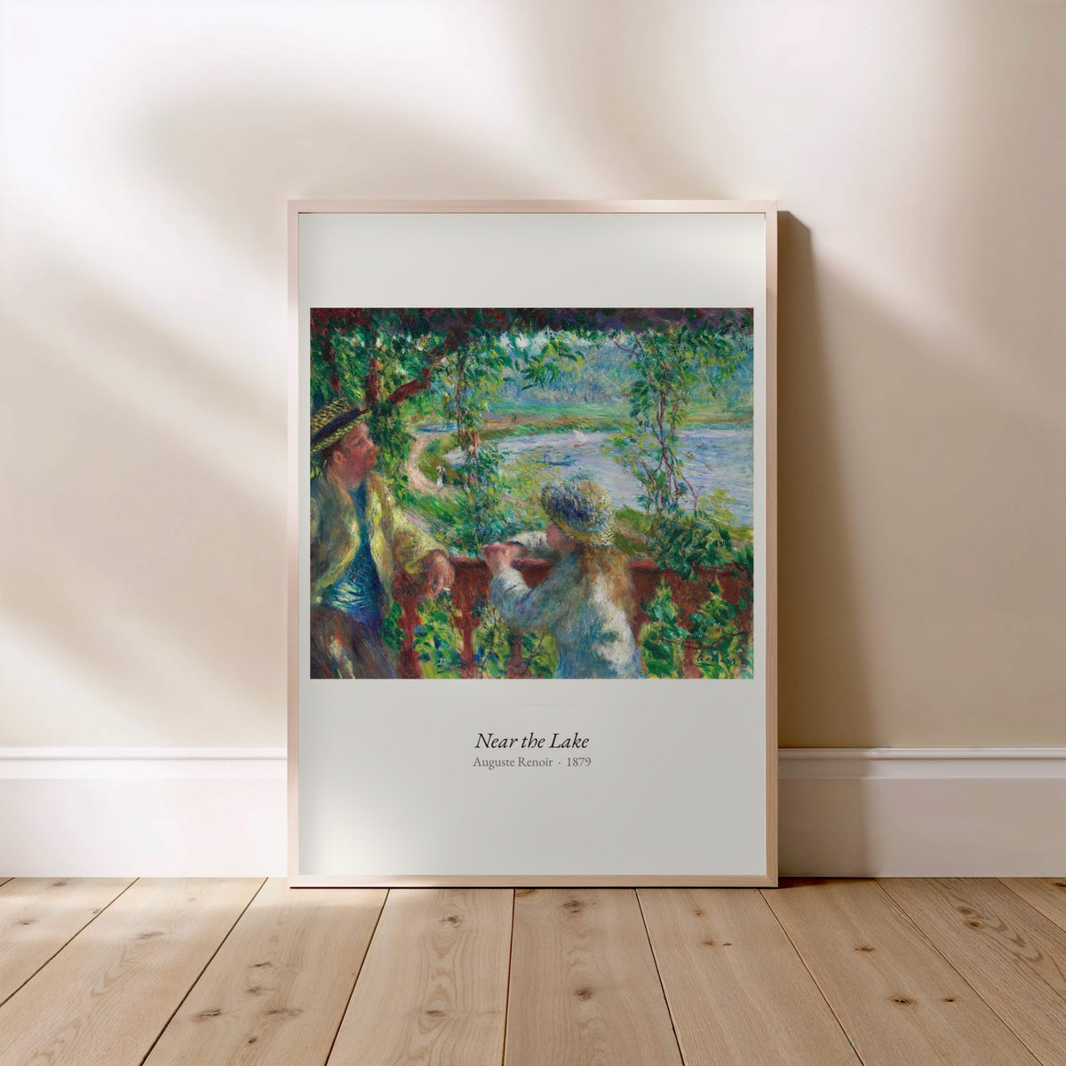 Near the Lake, Auguste Renoir | Affiche Art Premium, affiche encadrée posée au sol, cadre bois clair