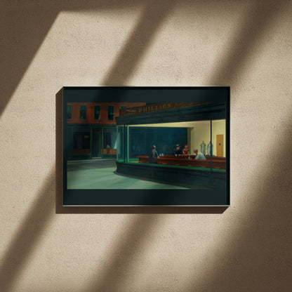 Edward Hopper Nighthawks print, 24x16 in fine art, framed on a textured wall in raking light