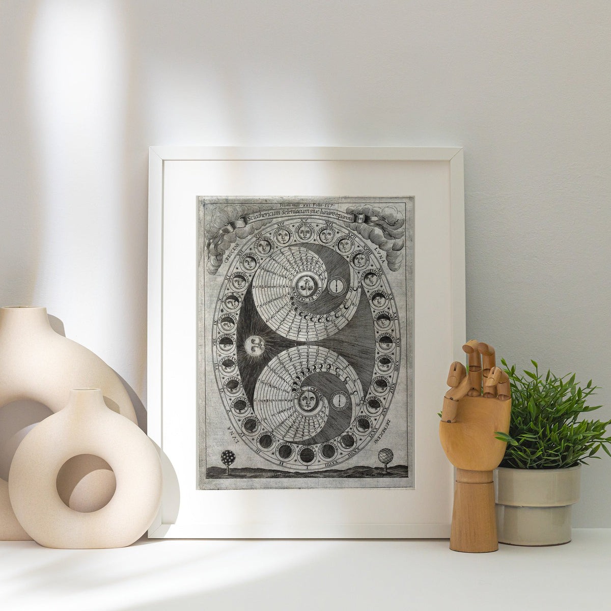 Sciathericum - Baroque Sundial - Vintage Science Poster, framed poster next to a white vase, raking light